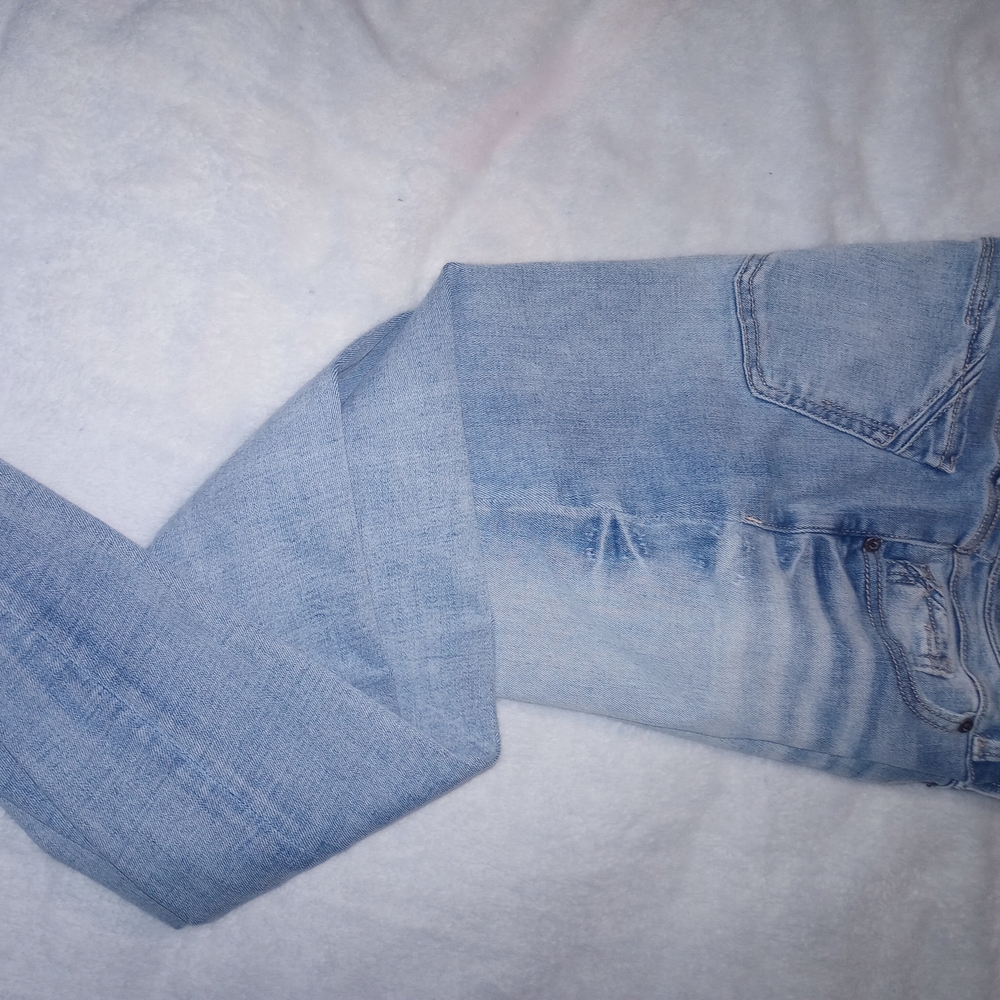 Buckle Light Wash Skinny Jeans